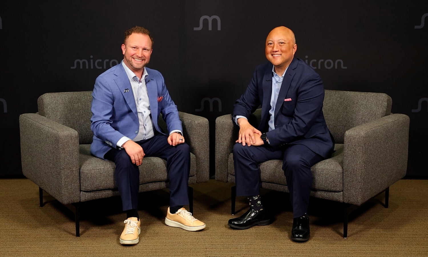 Micron's Jeremy Werner and Astera Labs' Thad Omura smiling while seated